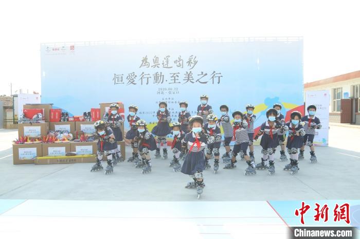 在奥林匹克日来临之际正式启动为奥运喝彩恒爱